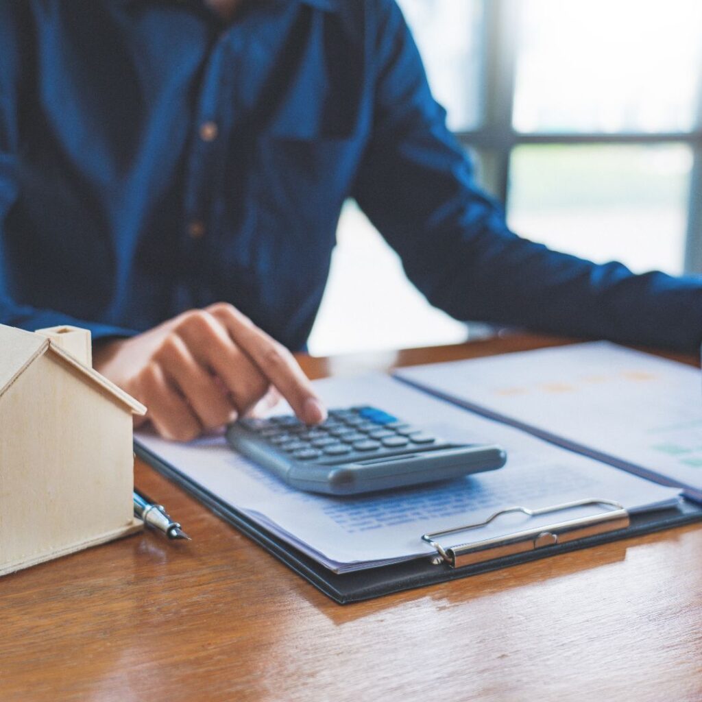 Man using calculator
