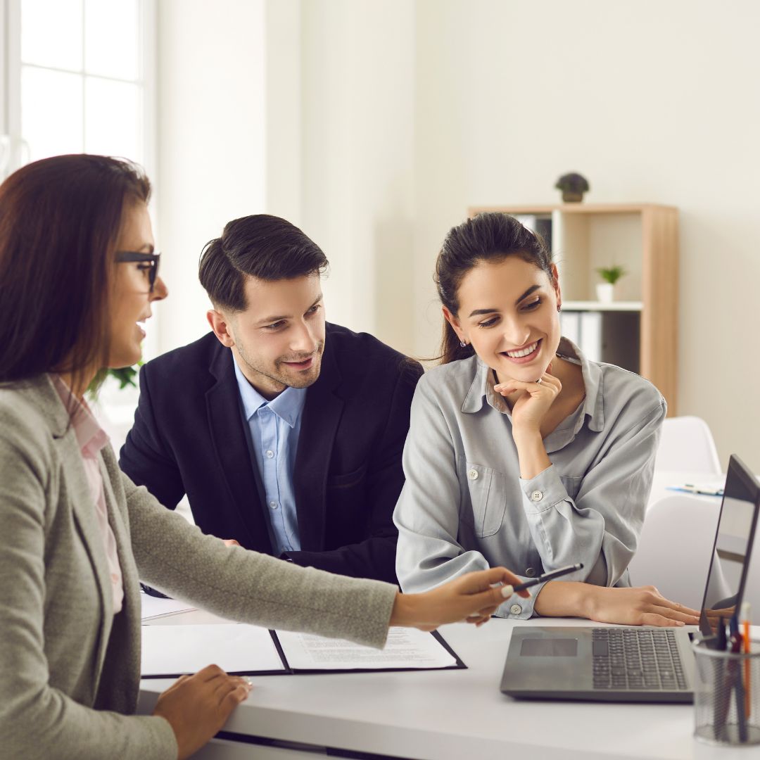 People talking with loan officer