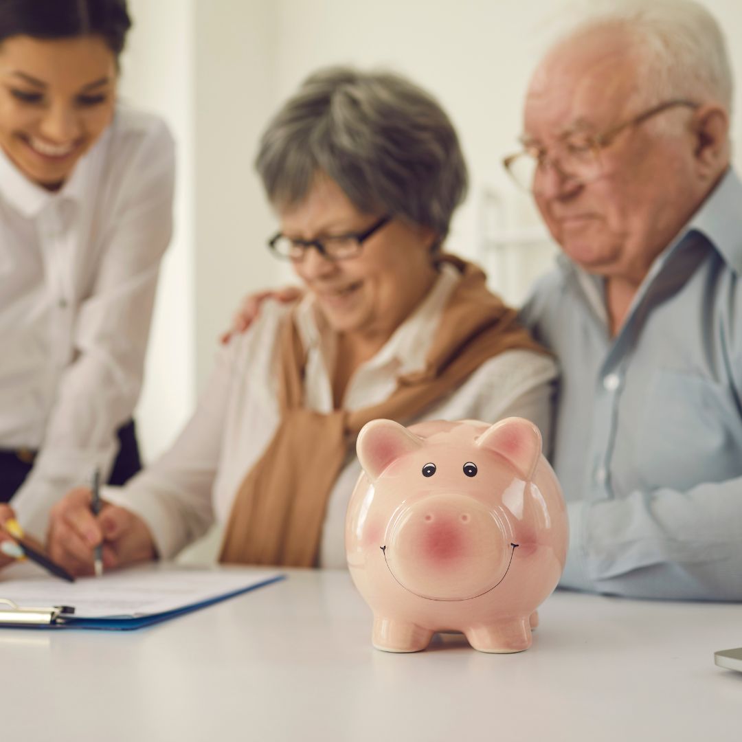 Seniors signing mortgage