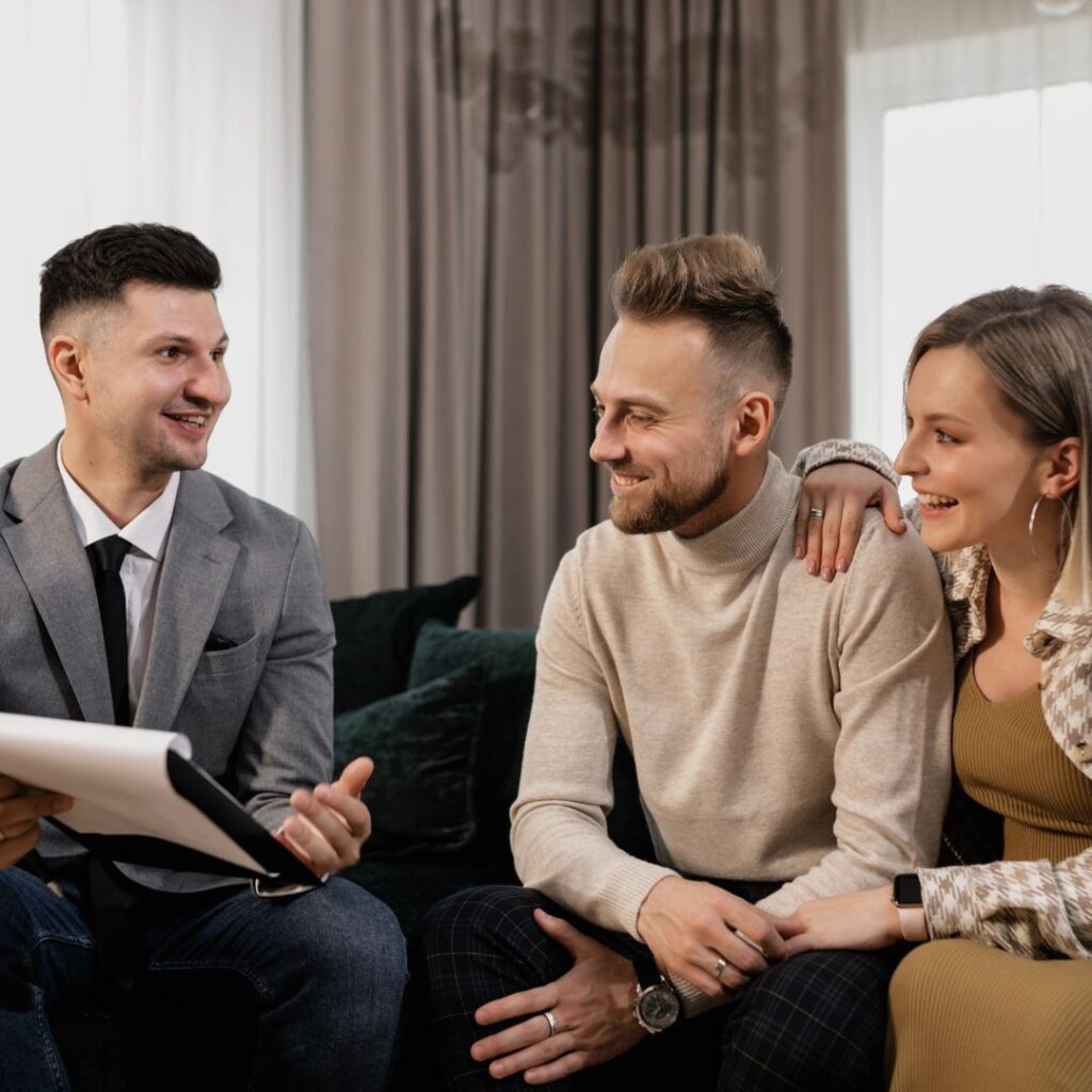 First-time home buyers talking with an expert