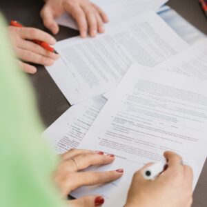 People look over documents