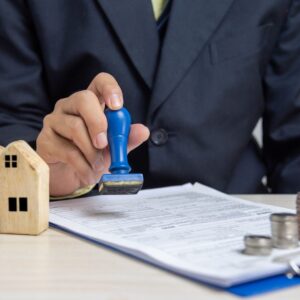 Person stamps home documents